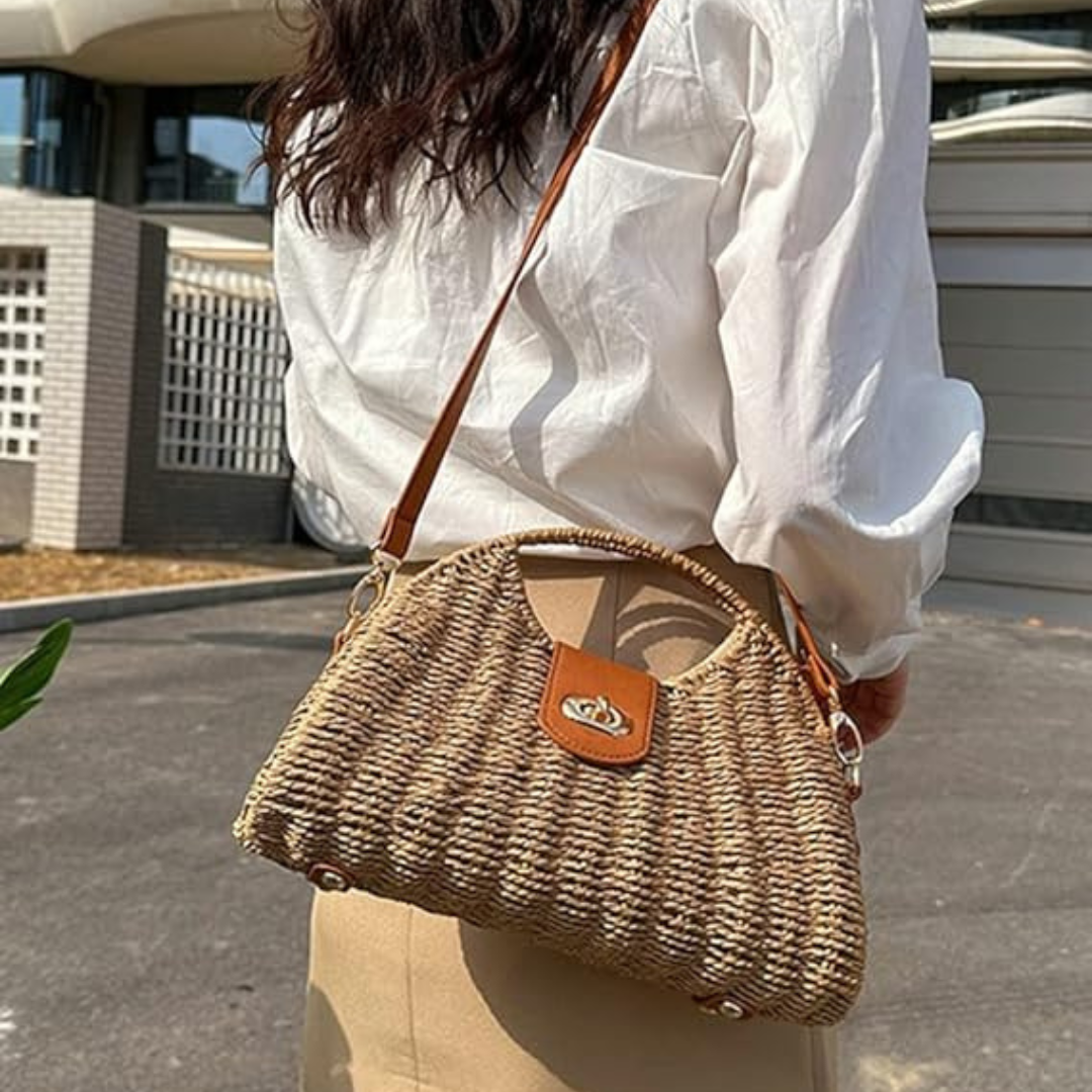 Bolso tejido con broche dorado sofisticado